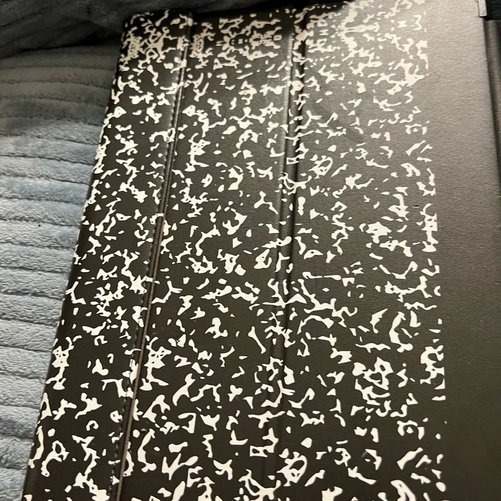 Ten inch composition note book tablet cover.